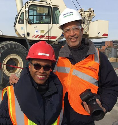 two-engineers-smiling-construction-site